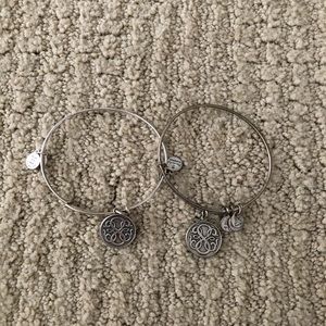 Two silver Alex and Ani bangle bracelets